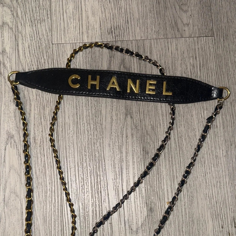 CHANEL Black Quilted Mini Bag with Gold Accents